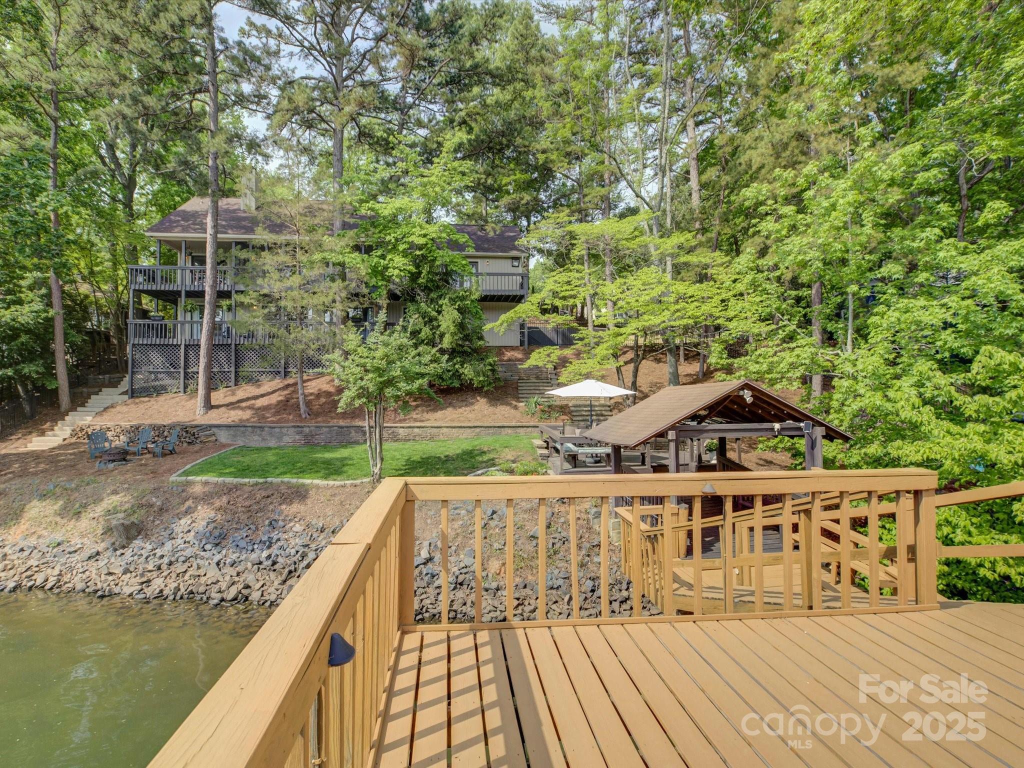 1114 Palmyra Drive Tega Cay, SC 29708 - Photo 40 of 48 a view of a house with a ocean view