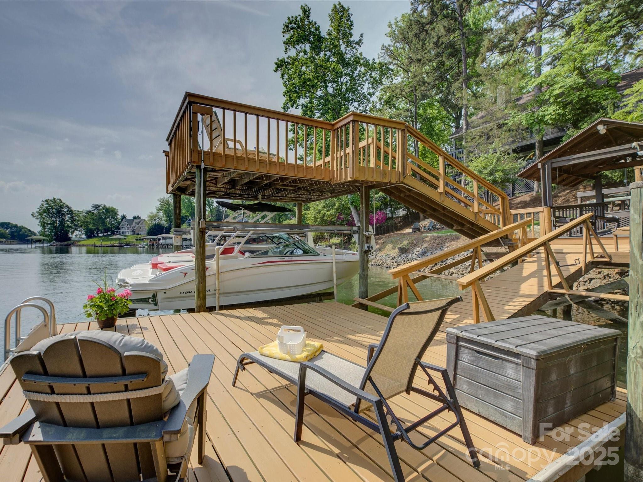 1114 Palmyra Drive Tega Cay, SC 29708 - Photo 43 of 48 a view of a chairs and table in the balcony
