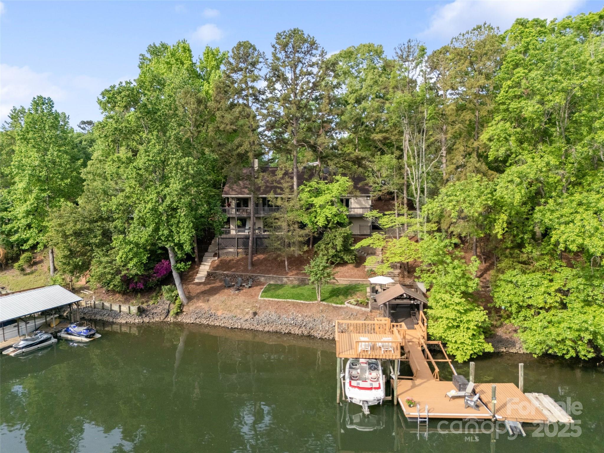 1114 Palmyra Drive Tega Cay, SC 29708 - Photo 46 of 48 a view of a lake with houses