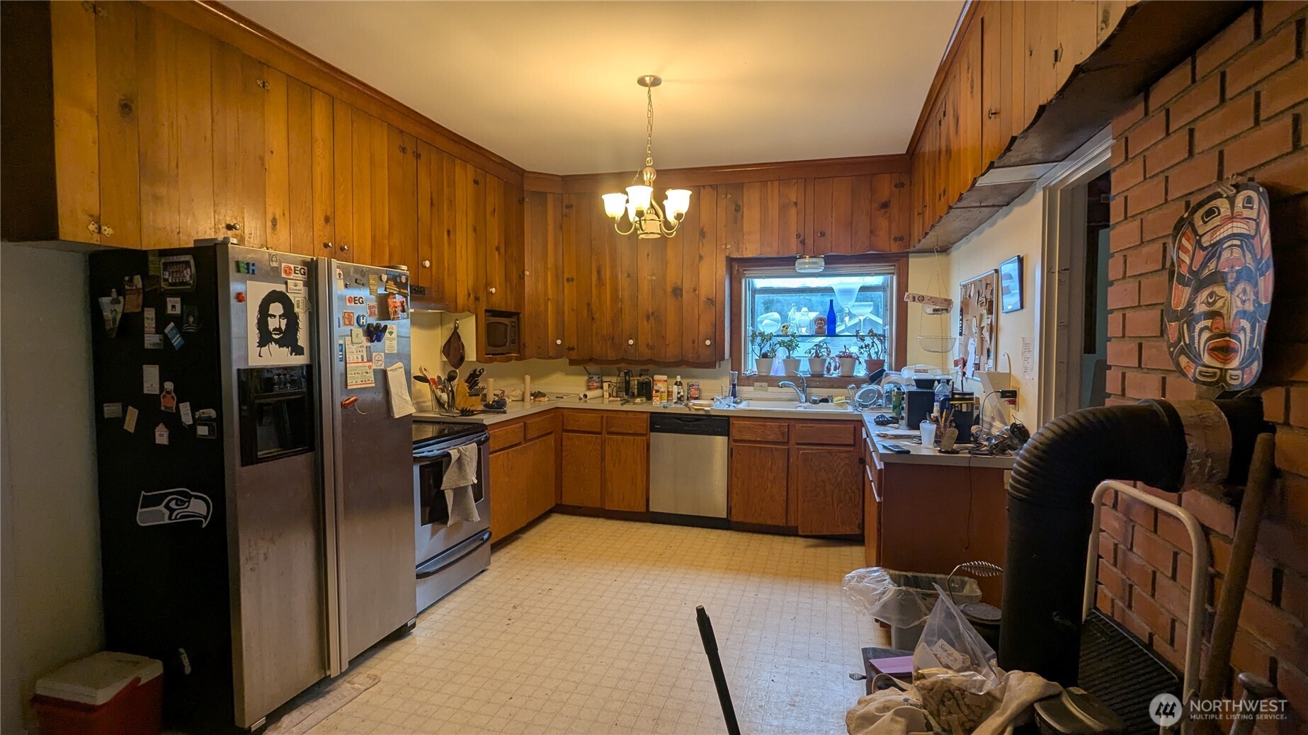24216 High Bridge Road Monroe, WA 98272 - Photo 12 of 24 a kitchen with refrigerator and window
