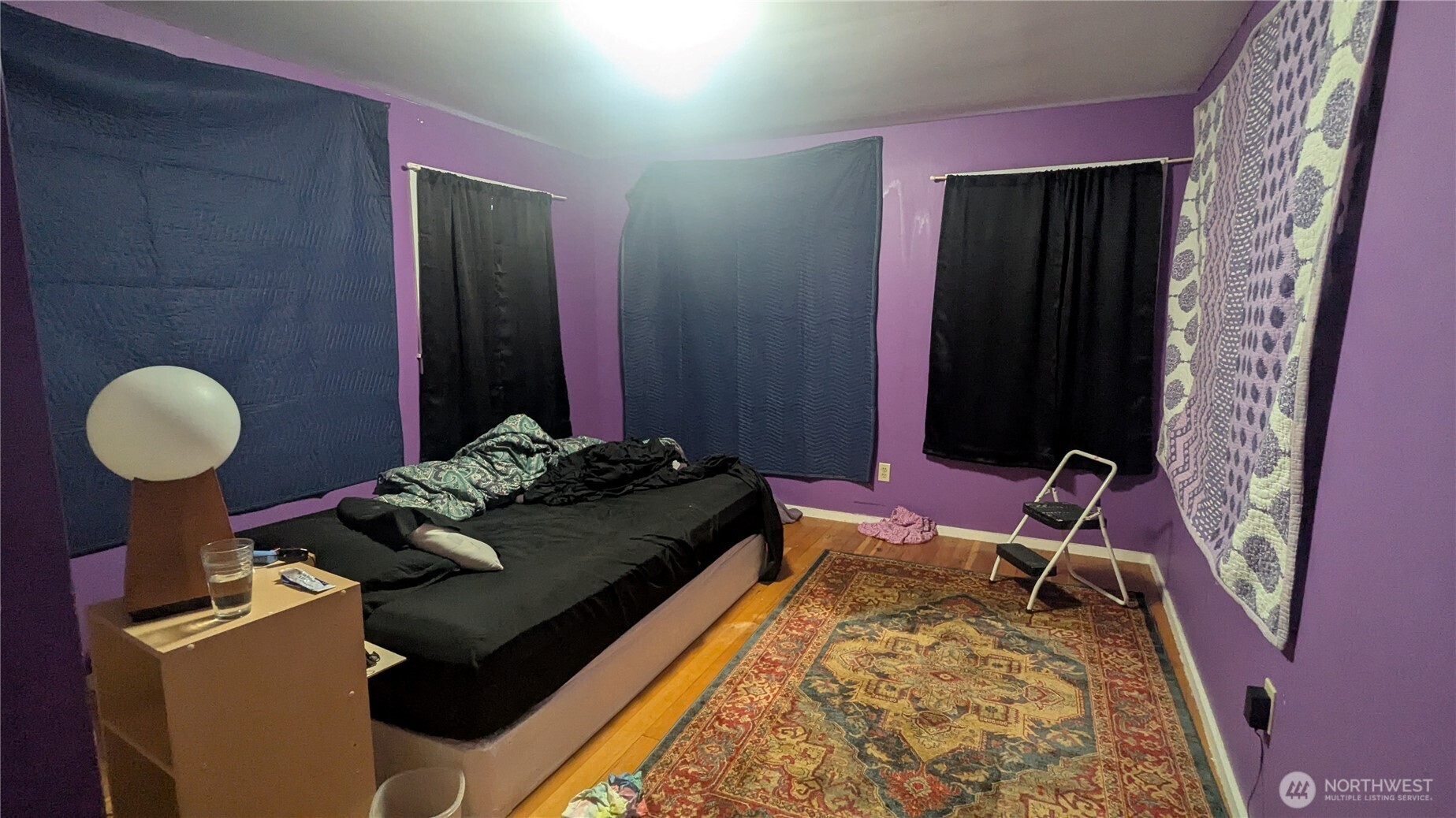 24216 High Bridge Road Monroe, WA 98272 - Photo 16 of 24 a bedroom with bed and a mirror