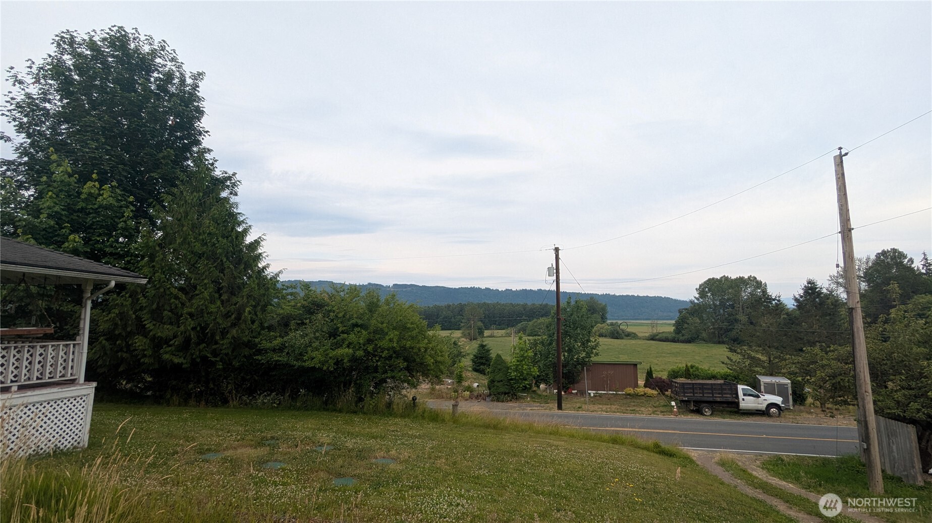 24216 High Bridge Road Monroe, WA 98272 - Photo 6 of 24 a view of a green field with sitting area
