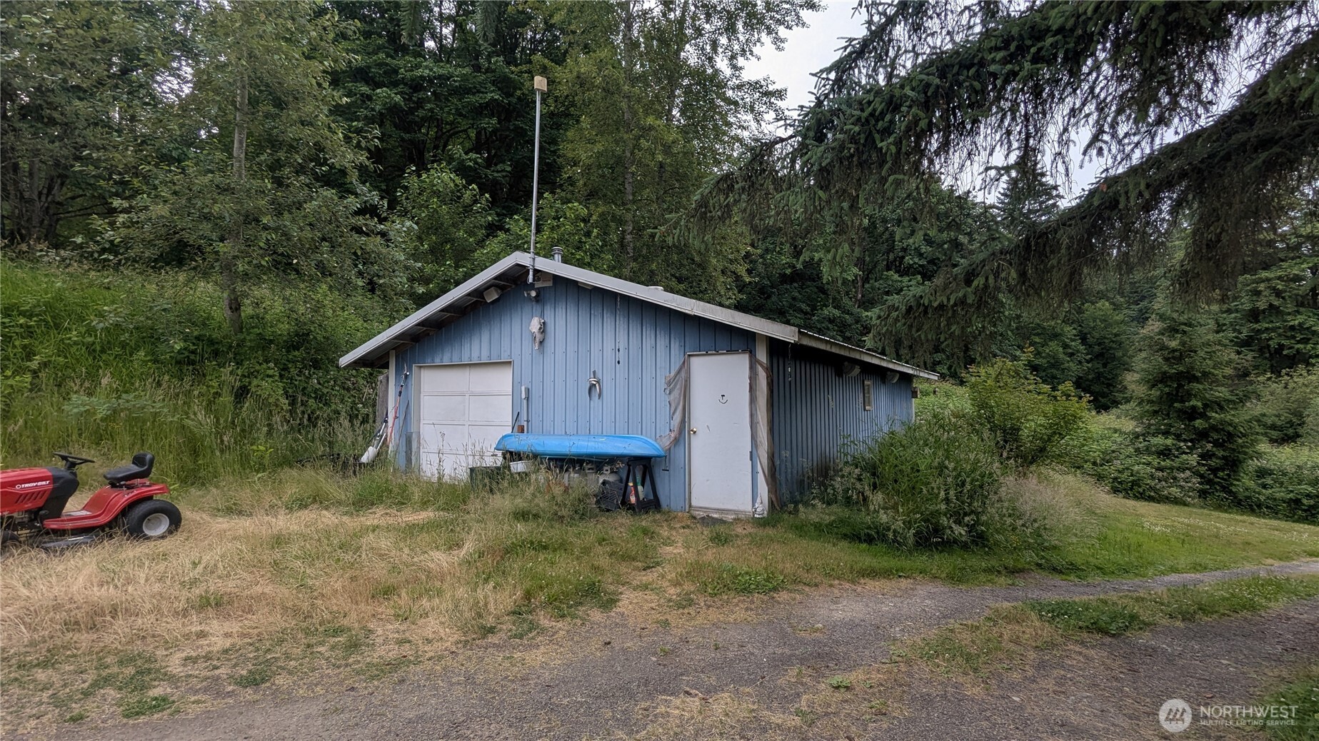 24216 High Bridge Road Monroe, WA 98272 - Photo 8 of 24 a backyard of a house with lots of green space
