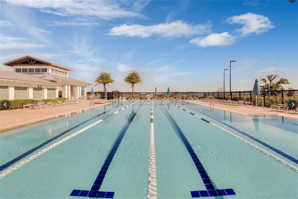 2665 Meadowedge Loop St. Cloud, FL 34772 - Photo 50 of 53 a view of residential houses with outdoor space and swimming pool