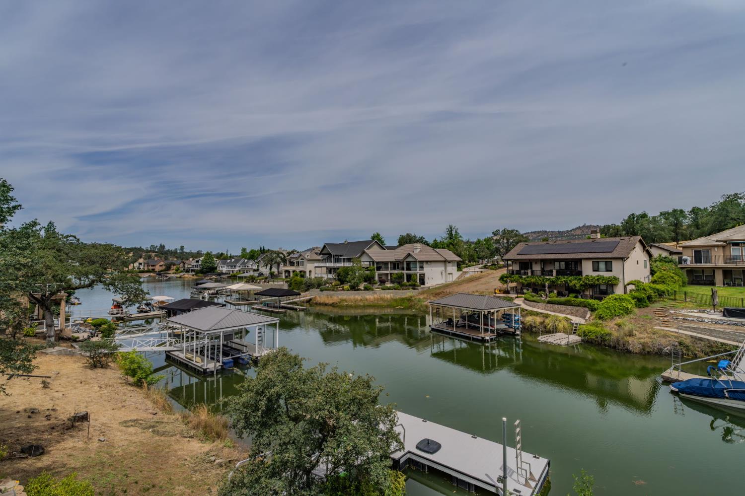 6066 Bluff View Road Copperopolis, CA 95228 - Photo 88 of 96 an aerial view of residential houses with outdoor space and lake view