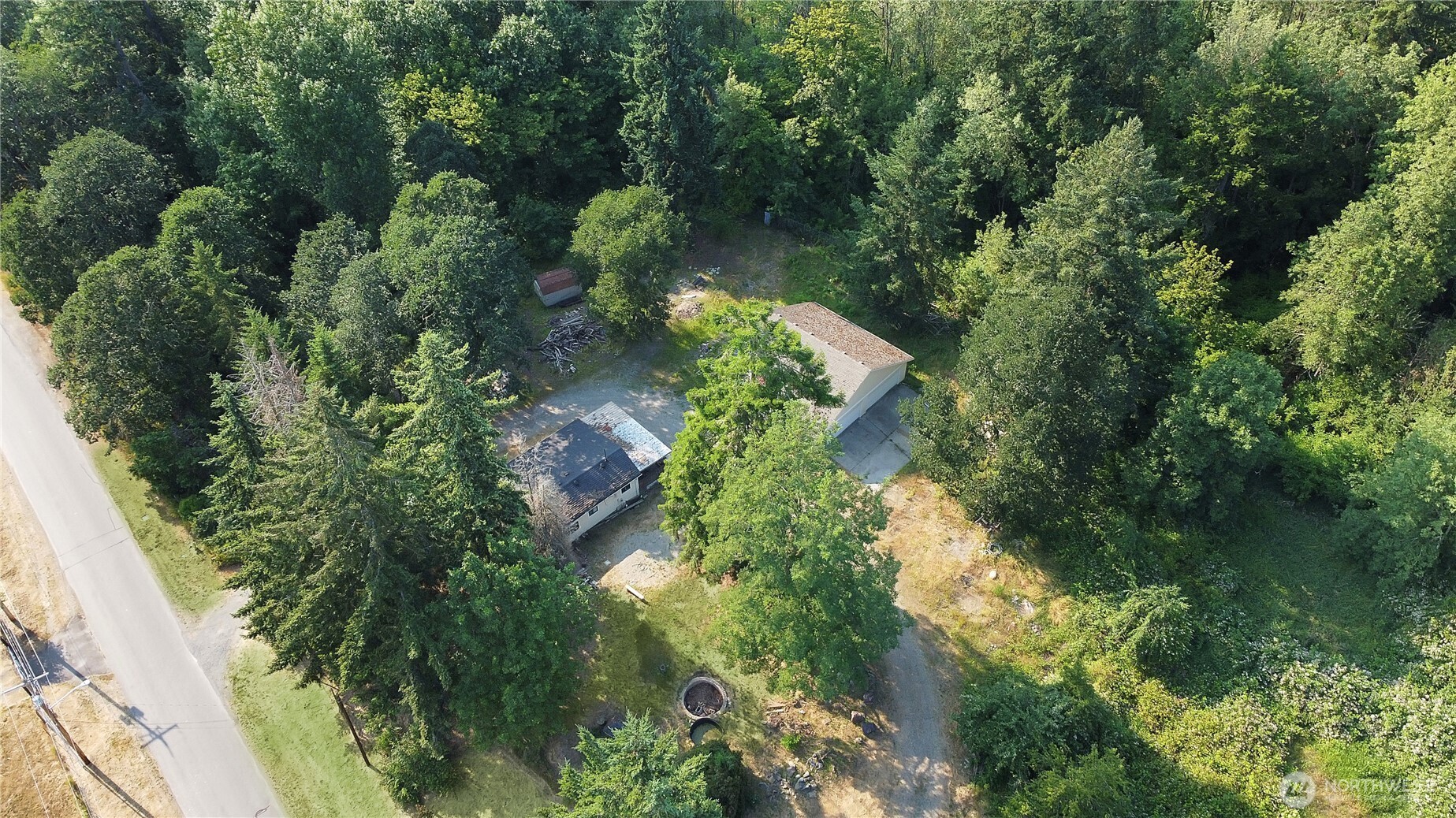 514 Higgins Greig Road South Roy, WA 98580 - Photo 1 of 19 an aerial view of a house with a yard