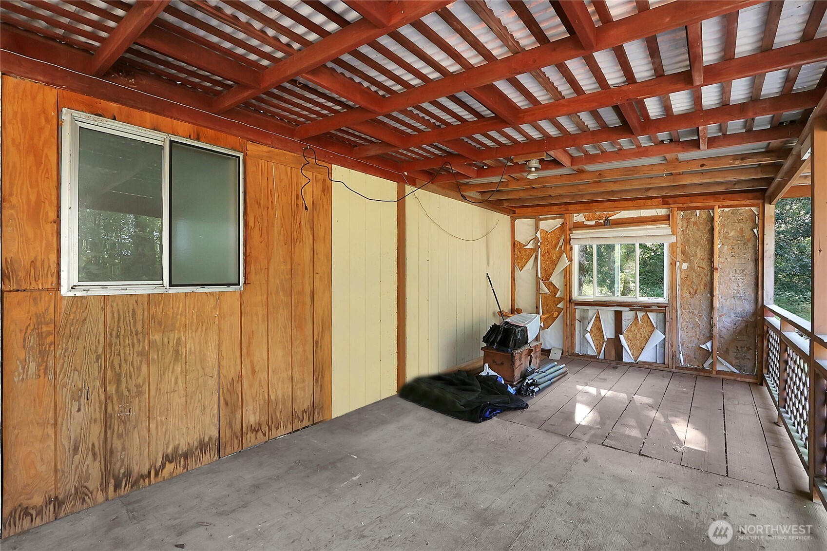 514 Higgins Greig Road South Roy, WA 98580 - Photo 15 of 19 a view of a room with wooden furniture and windows