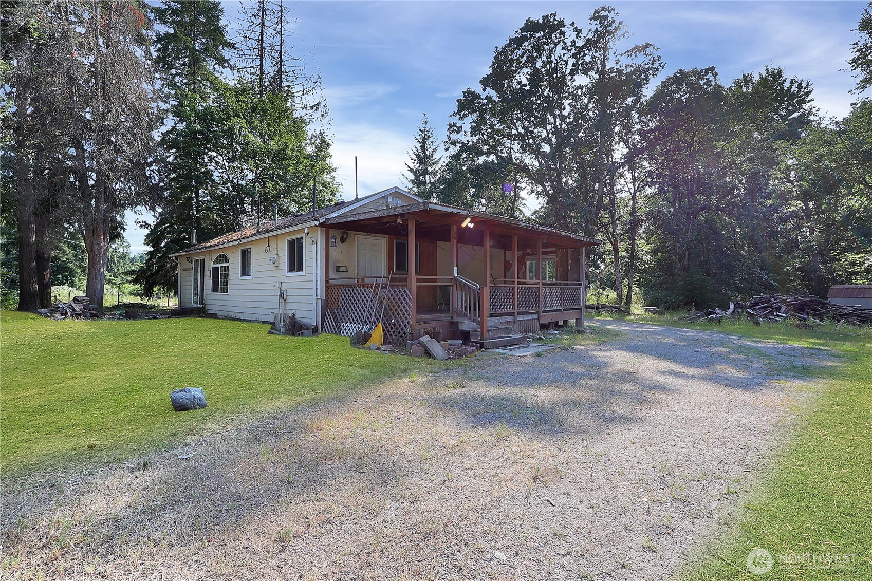 514 Higgins Greig Road South Roy, WA 98580 - Photo 17 of 19 a view of a house with backyard and trees