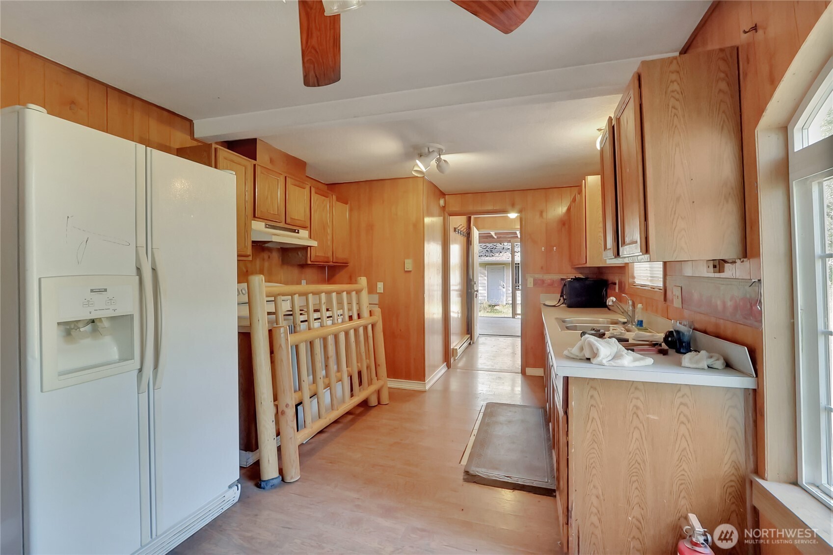 514 Higgins Greig Road South Roy, WA 98580 - Photo 6 of 19 a kitchen with stainless steel appliances kitchen island granite countertop a refrigerator and a stove