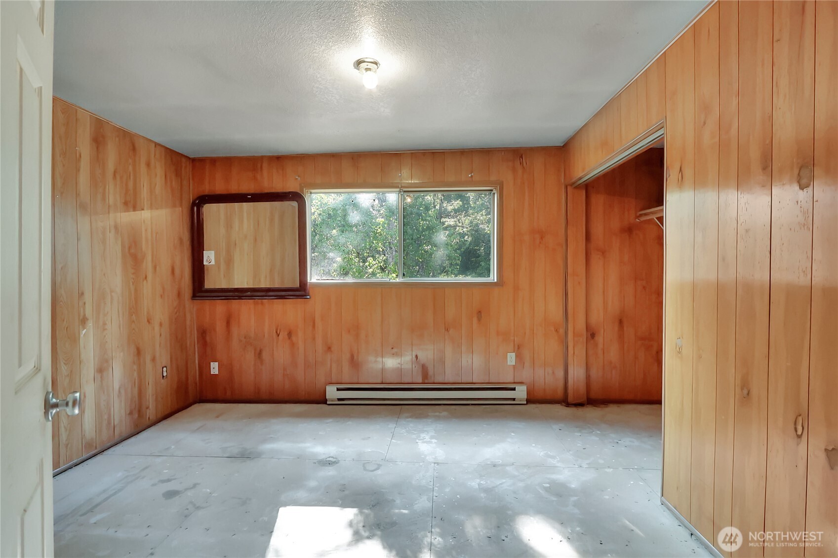 514 Higgins Greig Road South Roy, WA 98580 - Photo 10 of 19 a view of a room with wooden walls and window