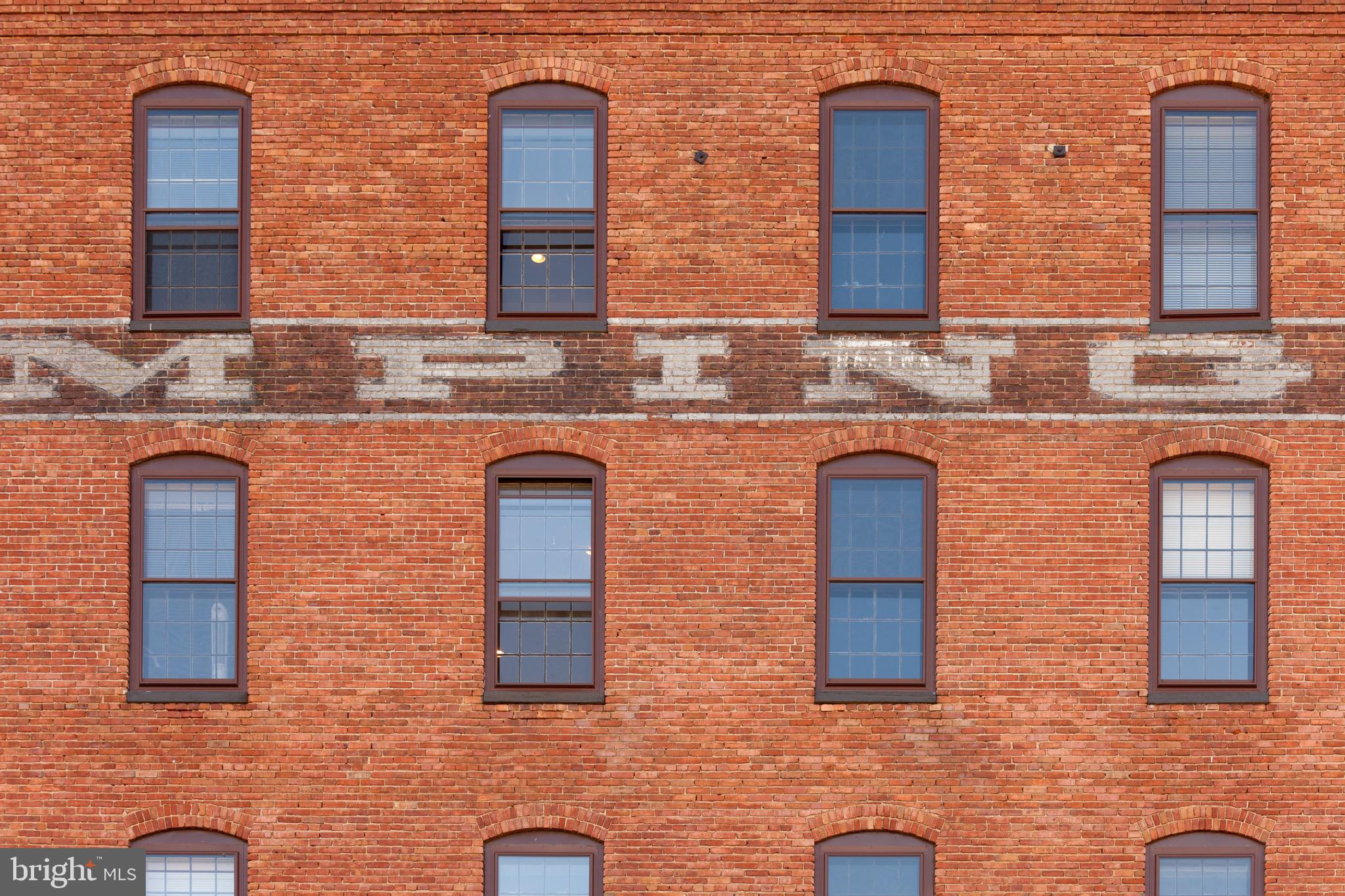 101 Wells Baltimore Md 21230, Unit 1BR Baltimore, MD 21230 - Photo 2 of 46 a bathroom with a sink and a mirror