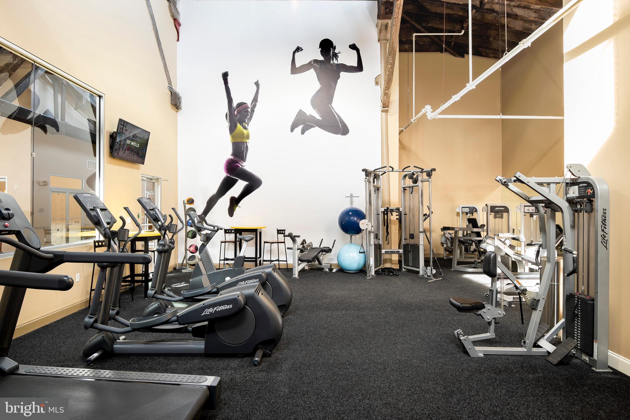 101 Wells Baltimore Md 21230, Unit 1BR Baltimore, MD 21230 - Photo 26 of 46 a view of a room with gym equipment