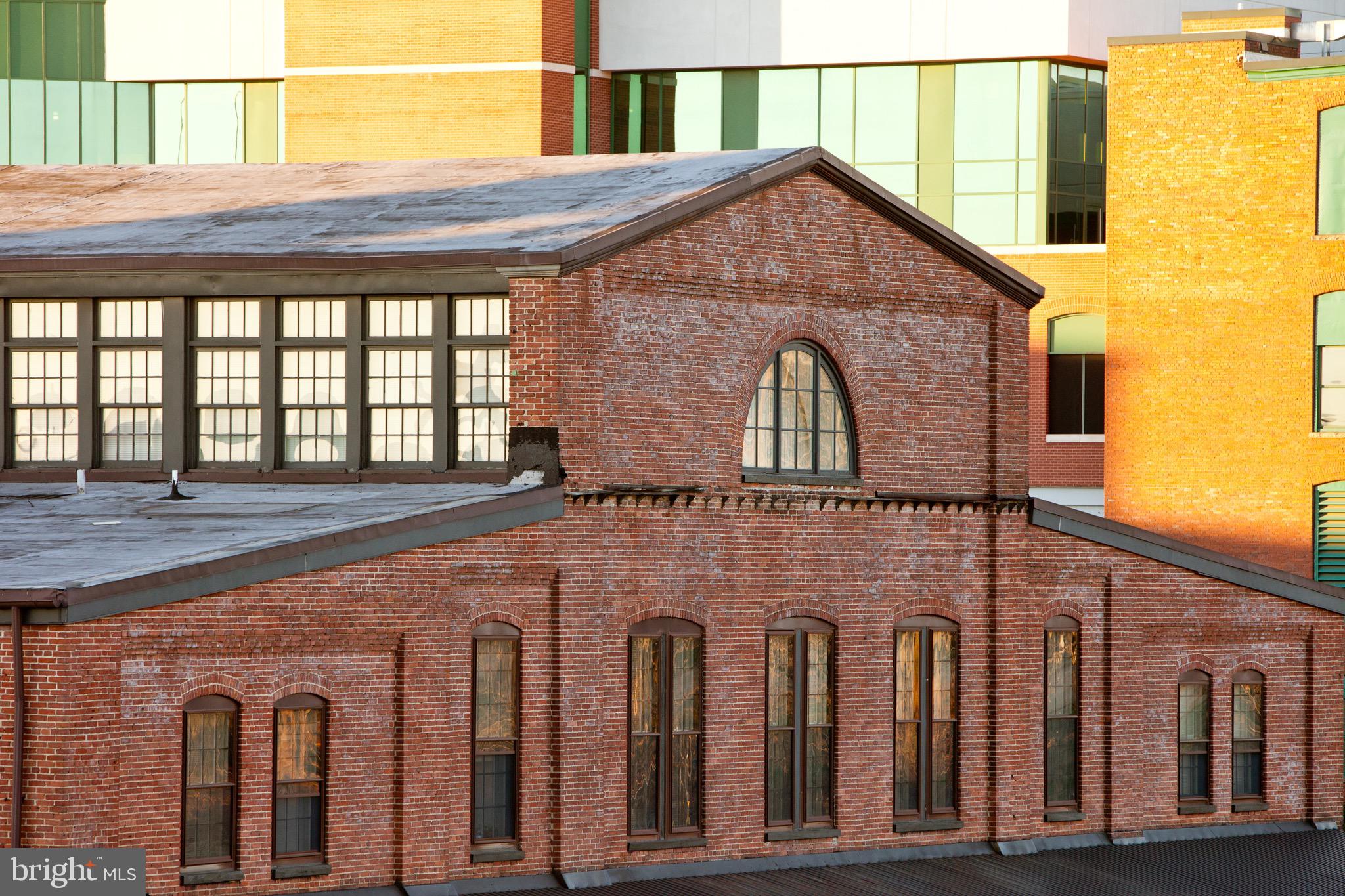 101 Wells Baltimore Md 21230, Unit 1BR Baltimore, MD 21230 - Photo 4 of 46 a front view of a house with large windows