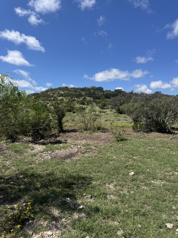 Lot 32 Private Road Rocksprings, TX 78880 - Photo 21 of 29 a view of a field with an ocean