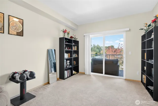 a view of a room with toys and wooden floor