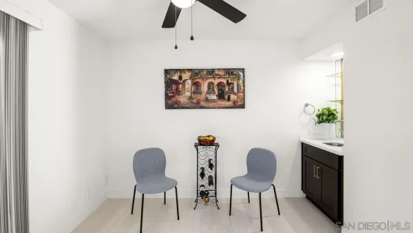 a workspace with furniture and a lamp