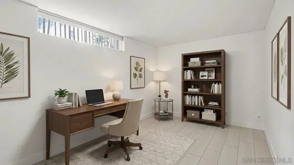 a view of a workspace with furniture