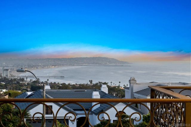 a view of roof deck with furniture