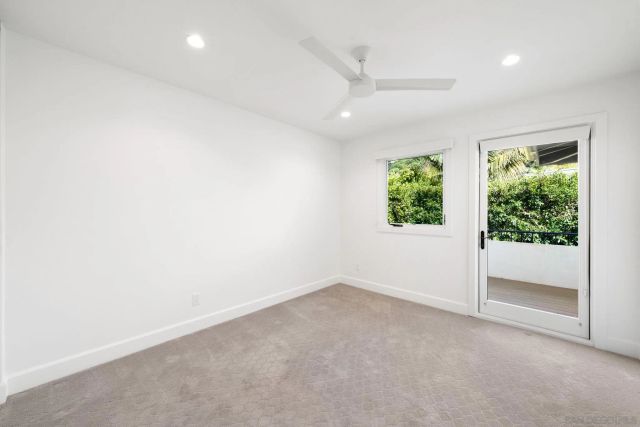 a view of a livingroom with wooden floor