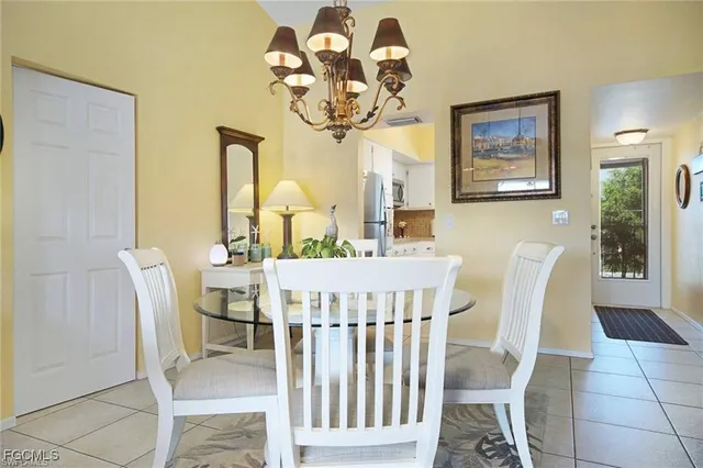 a kitchen with stainless steel appliances a sink and cabinets