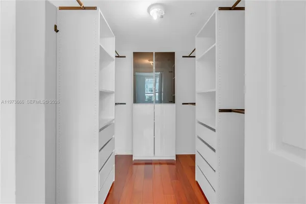 a view of front door with wooden floor