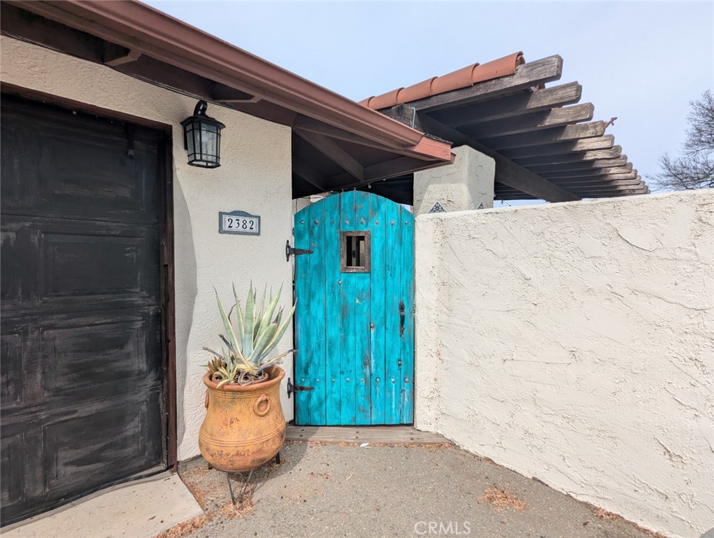 2382 Faber Street Durham, CA 95938 - Photo 1 of 20 a front view of a house with a potted plant and garage