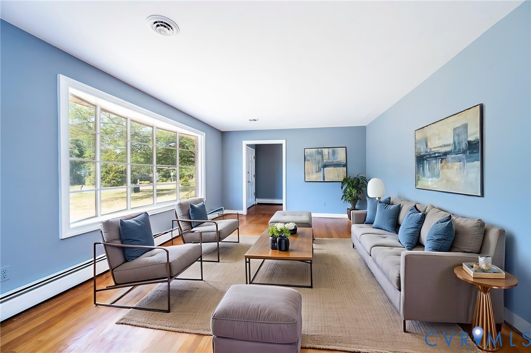 7514 Cold Harbor Road Mechanicsville, VA 23111 - Photo 6 of 34 Virtually staged front living room with abundant n