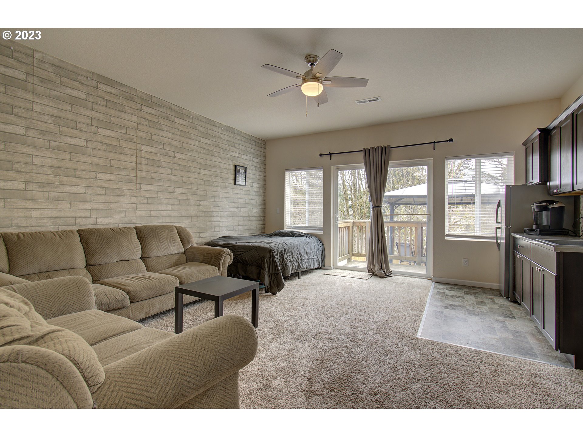 2726 South Red Tail Loop Ridgefield, WA 98642 - Photo 36 of 39 a living room with furniture and a large window