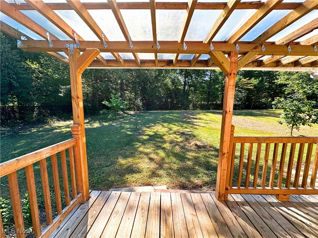 3885 Shields Road Canfield, OH 44406 - Photo 32 of 38 Wooden terrace with a lawn