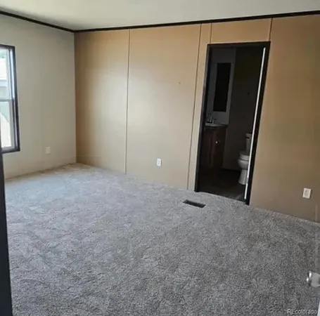 an empty room with closet