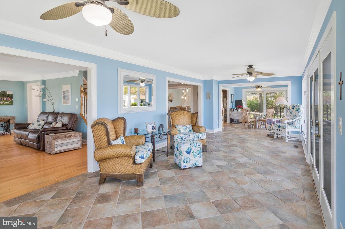 201 Edgewater Drive Edgewater, MD 21037 - Photo 11 of 49 a living room with fireplace furniture and a large window