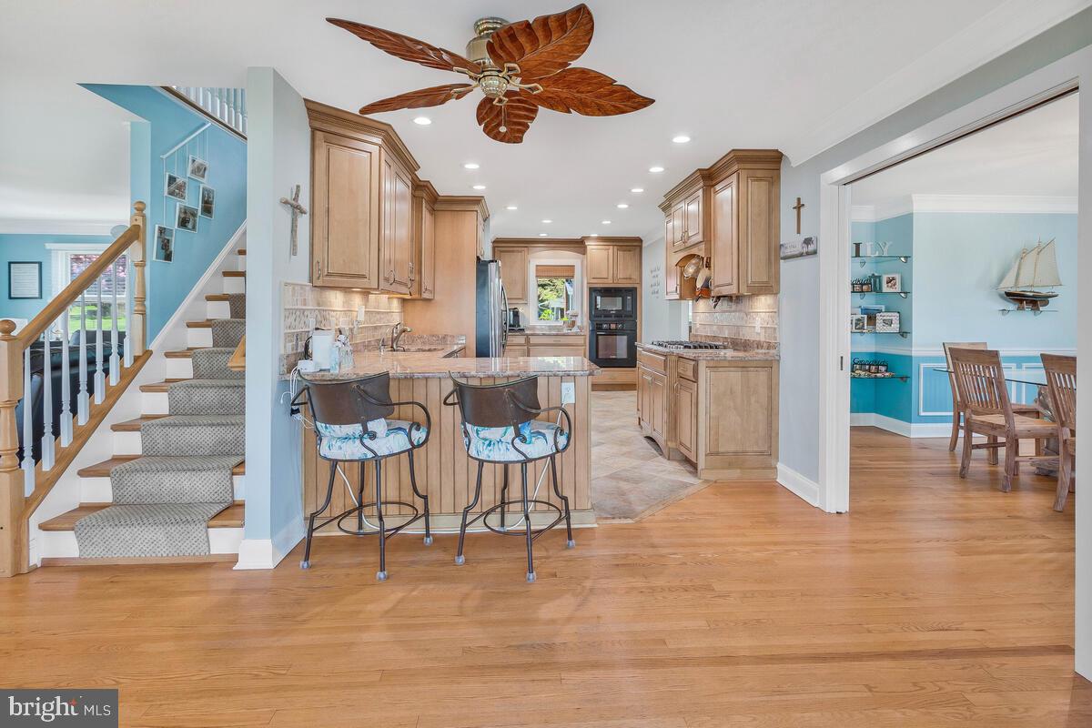 201 Edgewater Drive Edgewater, MD 21037 - Photo 16 of 49 a view of a dining room with furniture