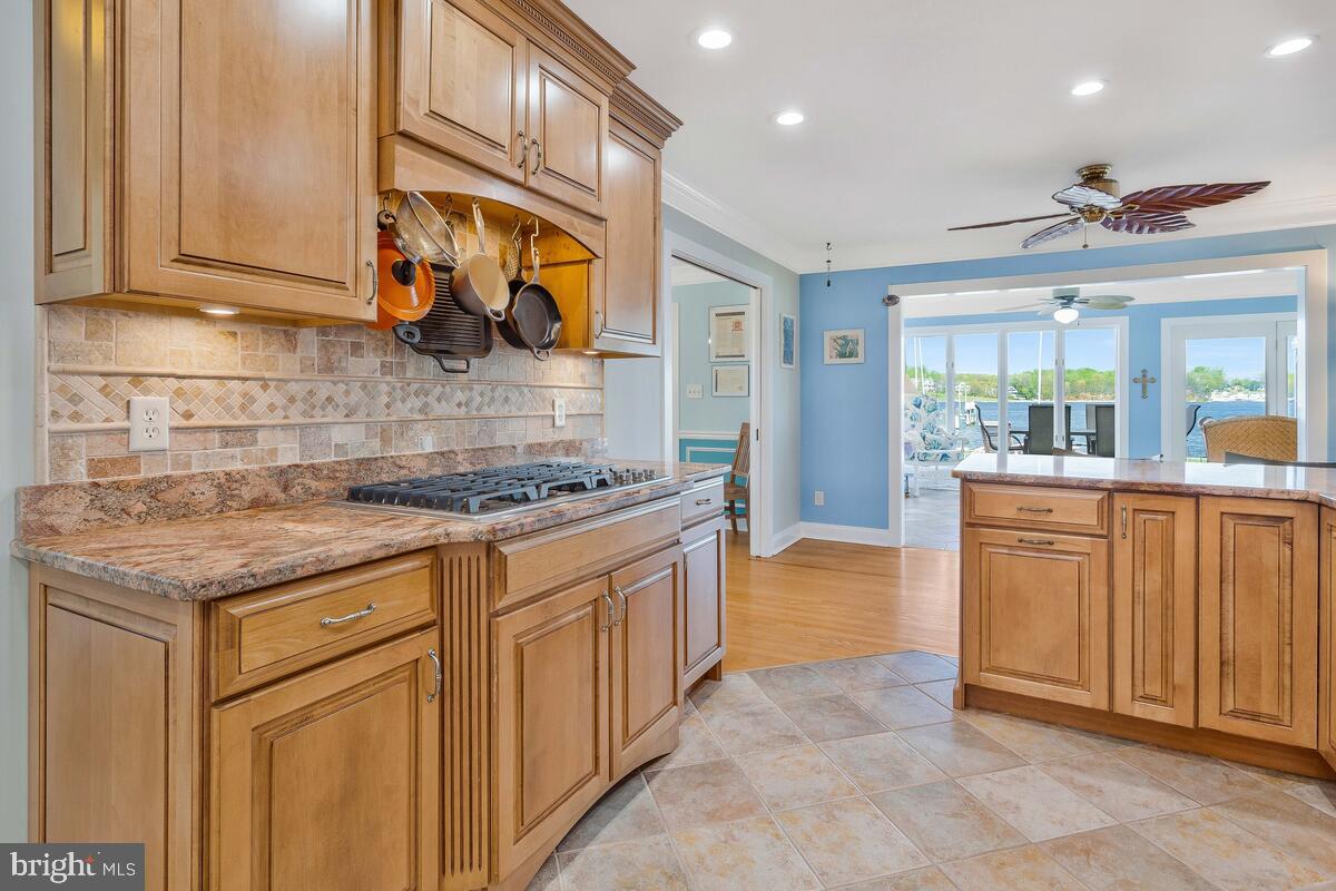 201 Edgewater Drive Edgewater, MD 21037 - Photo 17 of 49 a kitchen with stainless steel appliances granite countertop a sink and cabinets