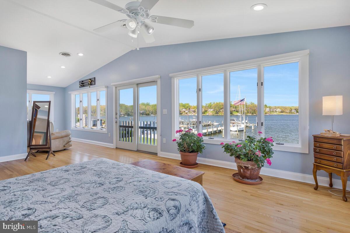 201 Edgewater Drive Edgewater, MD 21037 - Photo 21 of 49 a bedroom with furniture and a potted plant