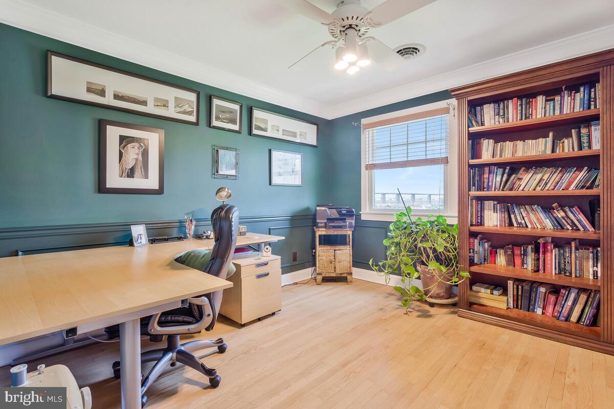 201 Edgewater Drive Edgewater, MD 21037 - Photo 24 of 49 a workspace with a bookshelf