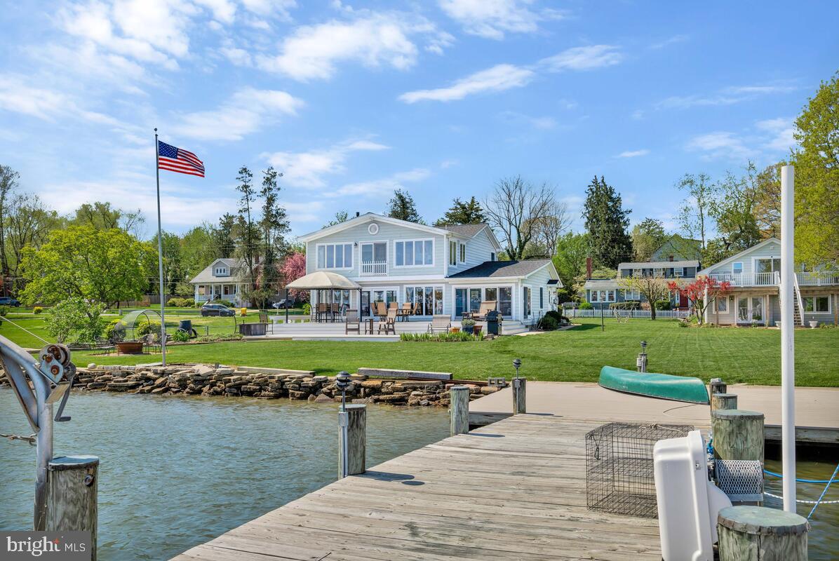 201 Edgewater Drive Edgewater, MD 21037 - Photo 3 of 49 a front view of a house with garden