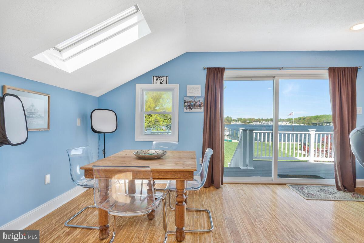 201 Edgewater Drive Edgewater, MD 21037 - Photo 32 of 49 a view of a dining room with furniture window and wooden floor