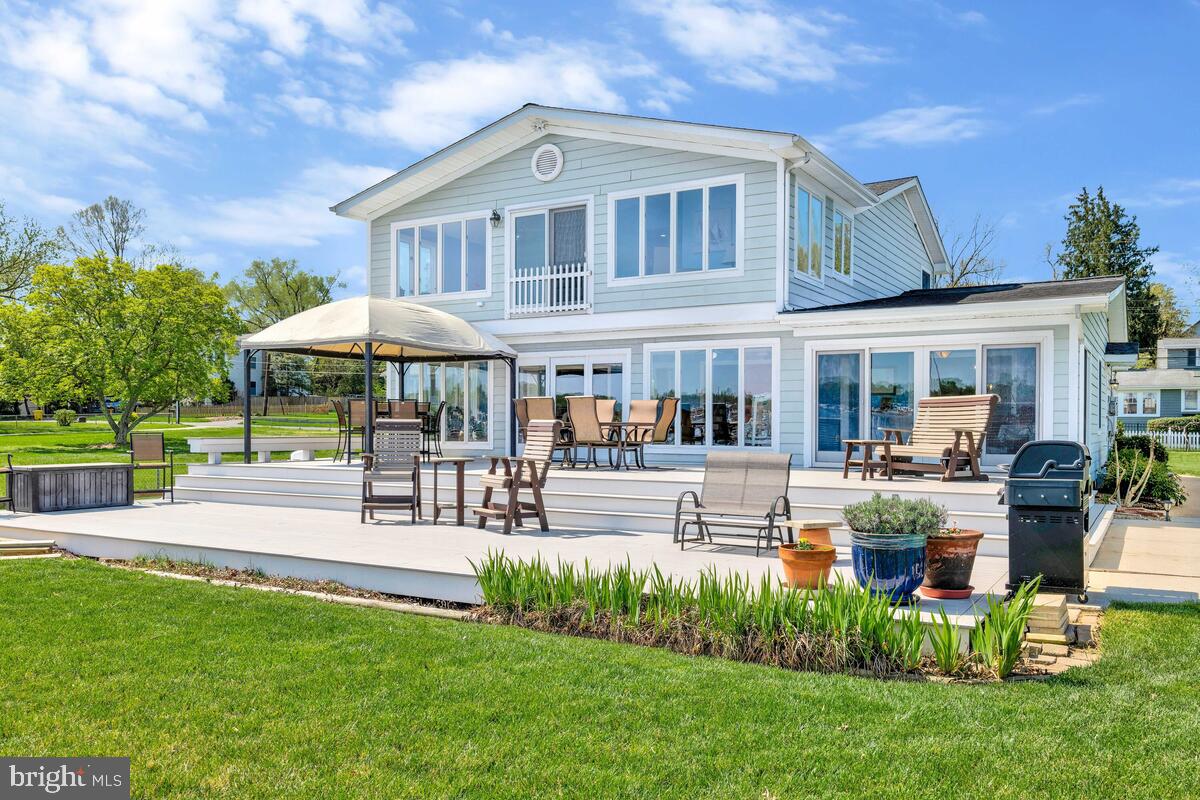 201 Edgewater Drive Edgewater, MD 21037 - Photo 33 of 49 a view of a house with a yard and furniture