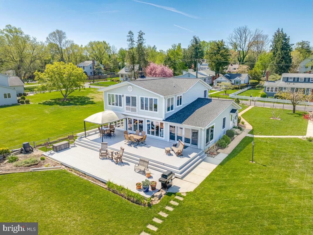 201 Edgewater Drive Edgewater, MD 21037 - Photo 36 of 49 a aerial view of a house with swimming pool a yard and lake view