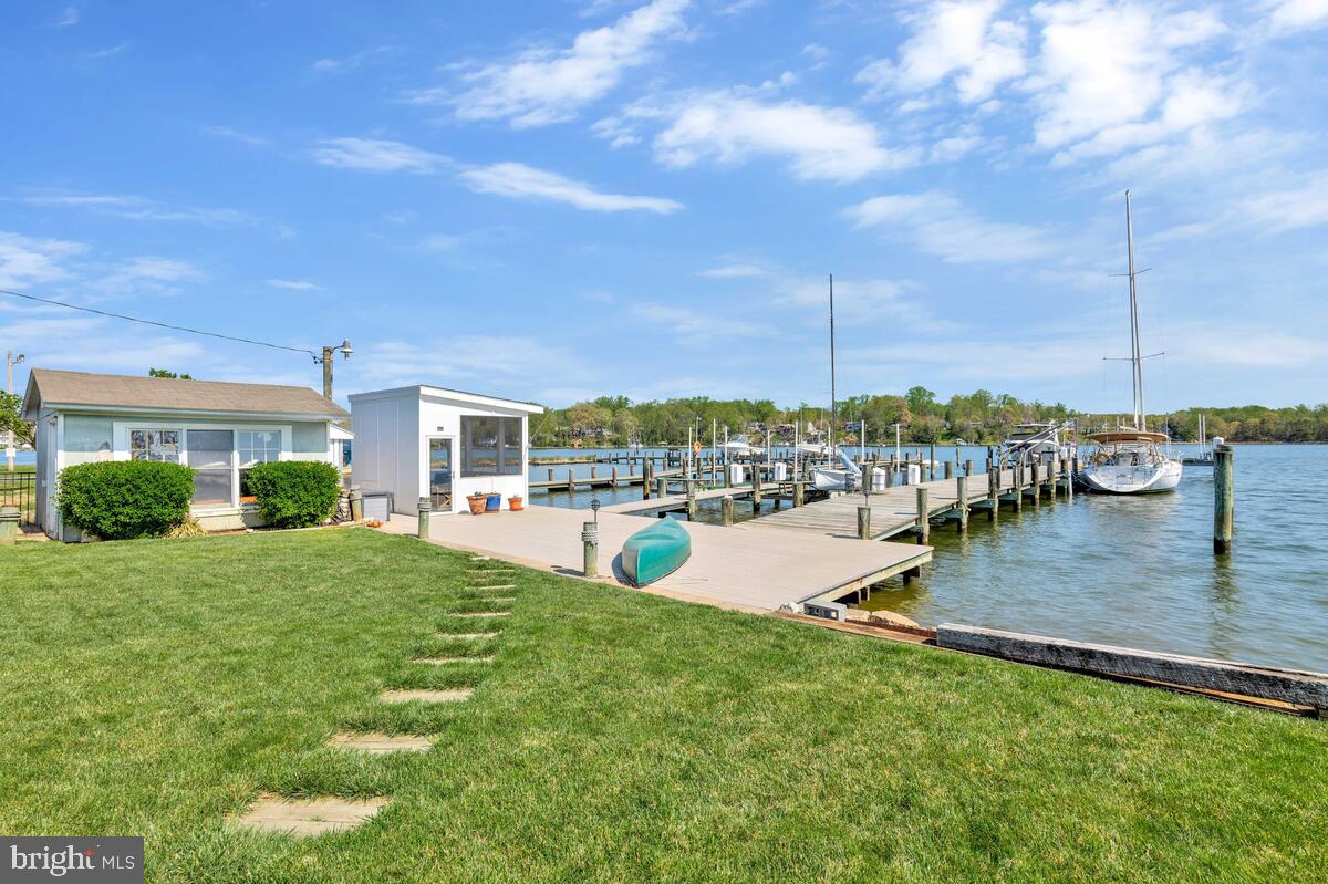201 Edgewater Drive Edgewater, MD 21037 - Photo 39 of 49 a view of a lake with couches and city view