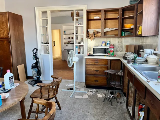 a room with a chair and gym equipment