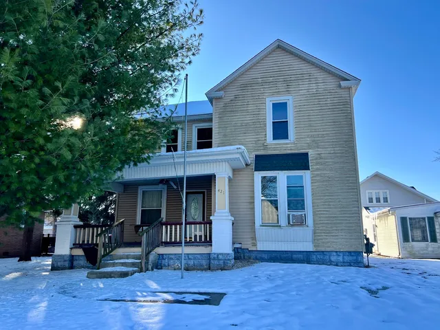 a front view of house with yard