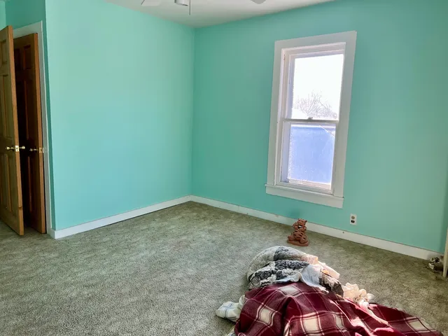 an empty room with an entryway
