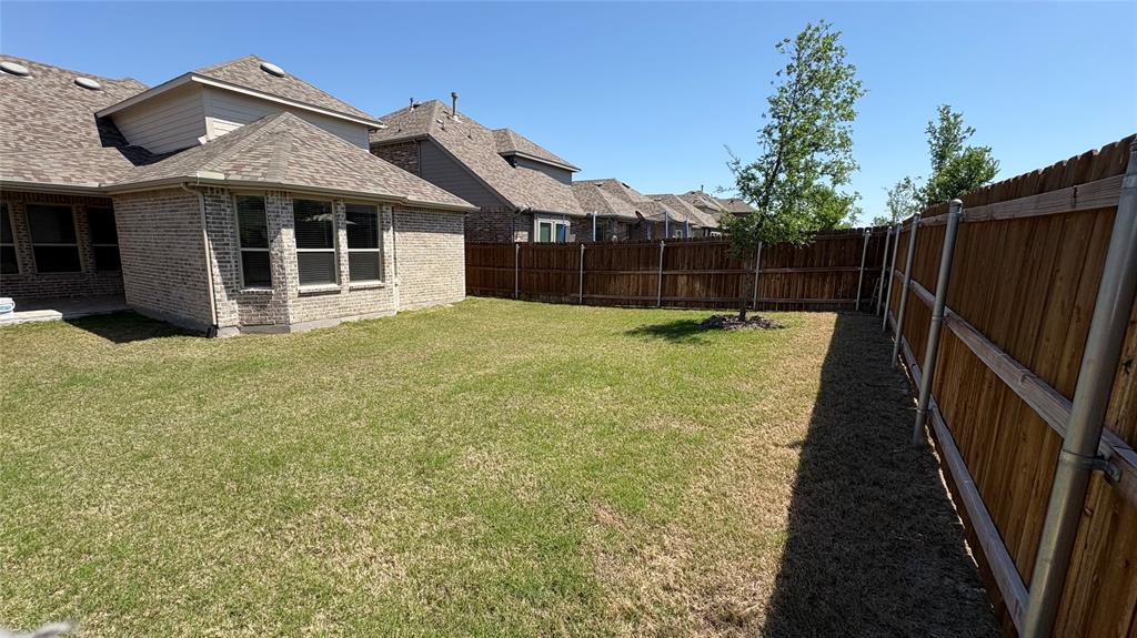 1801 Eagle Landing Van Alstyne, TX 75495 - Photo 17 of 27 View of yard featuring a fenced backyard