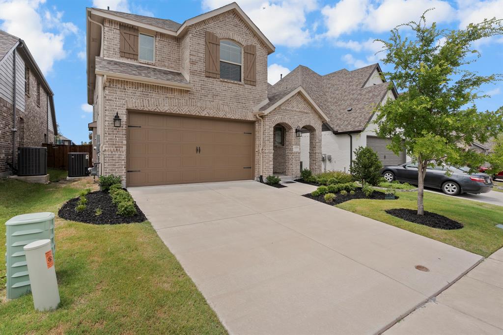 1801 Eagle Landing Van Alstyne, TX 75495 - Photo 20 of 27 View of front of home featuring brick siding, roof with shingles, driveway, and an attached garage