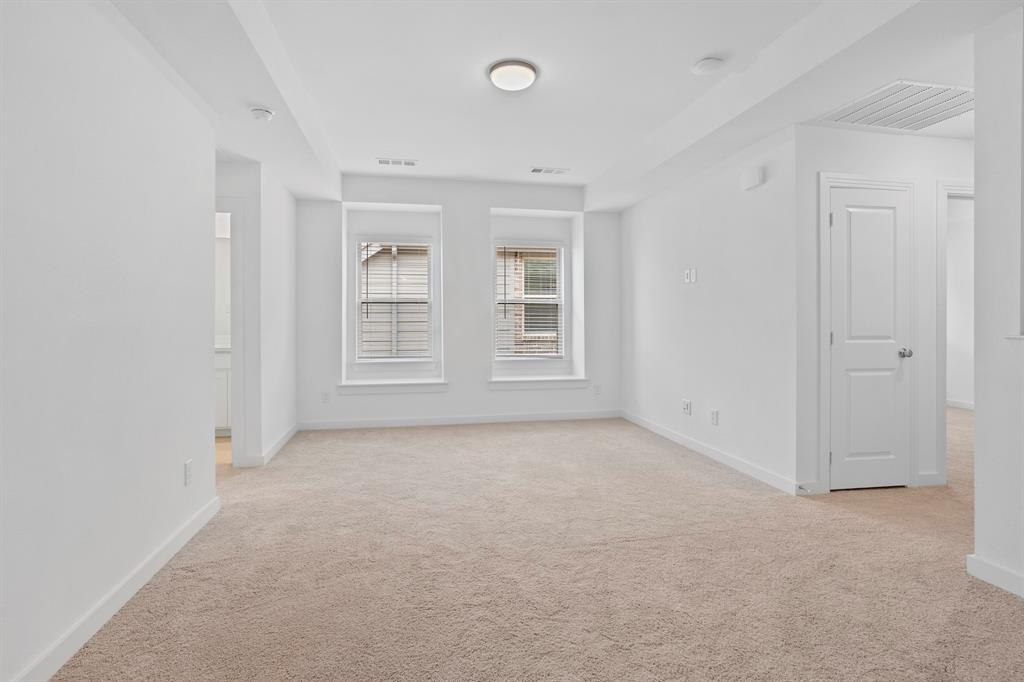 1801 Eagle Landing Van Alstyne, TX 75495 - Photo 23 of 27 Unfurnished room featuring light colored carpet and a smoke detector