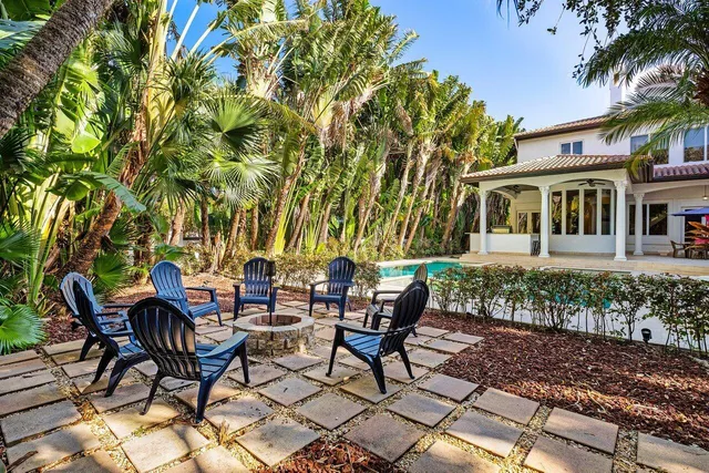 a view of backyard with tree