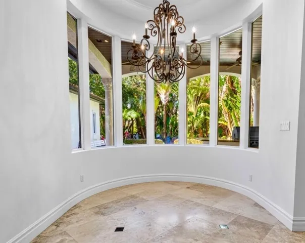 a bathroom with a bathtub a sink and a window