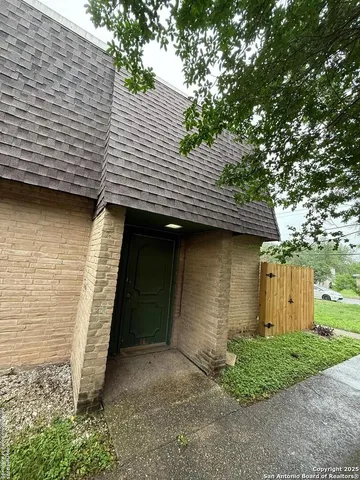 a front view of a house with garage