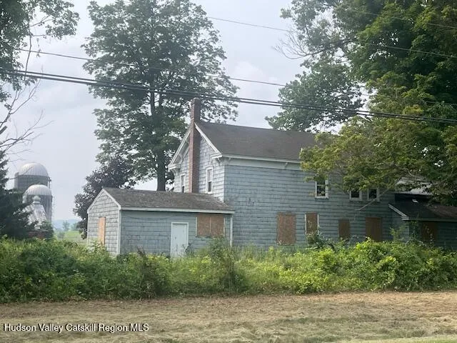 a house view with a garden space